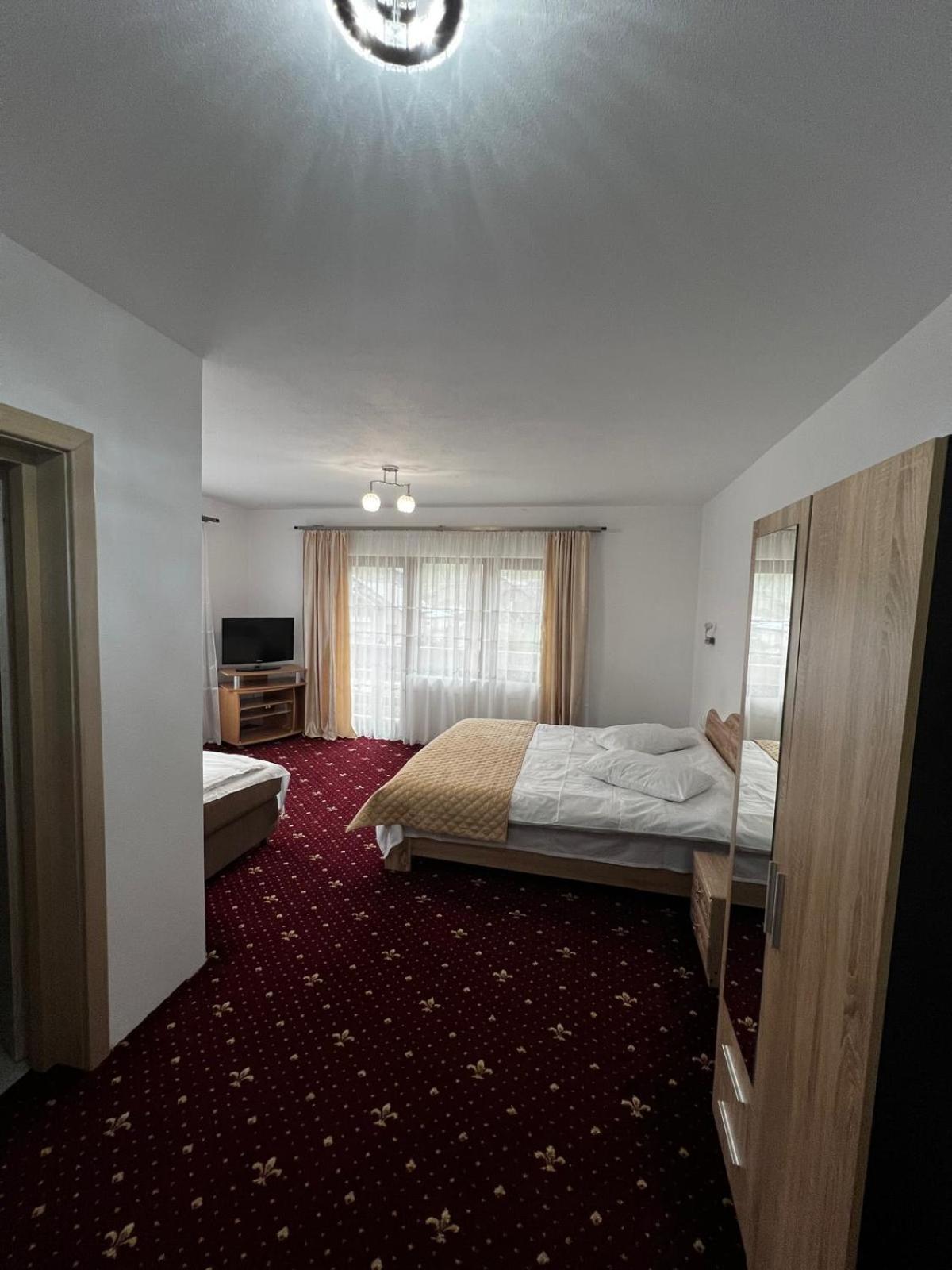Casa Bujor De Munte Dragoslavele Hotel Bagian luar foto